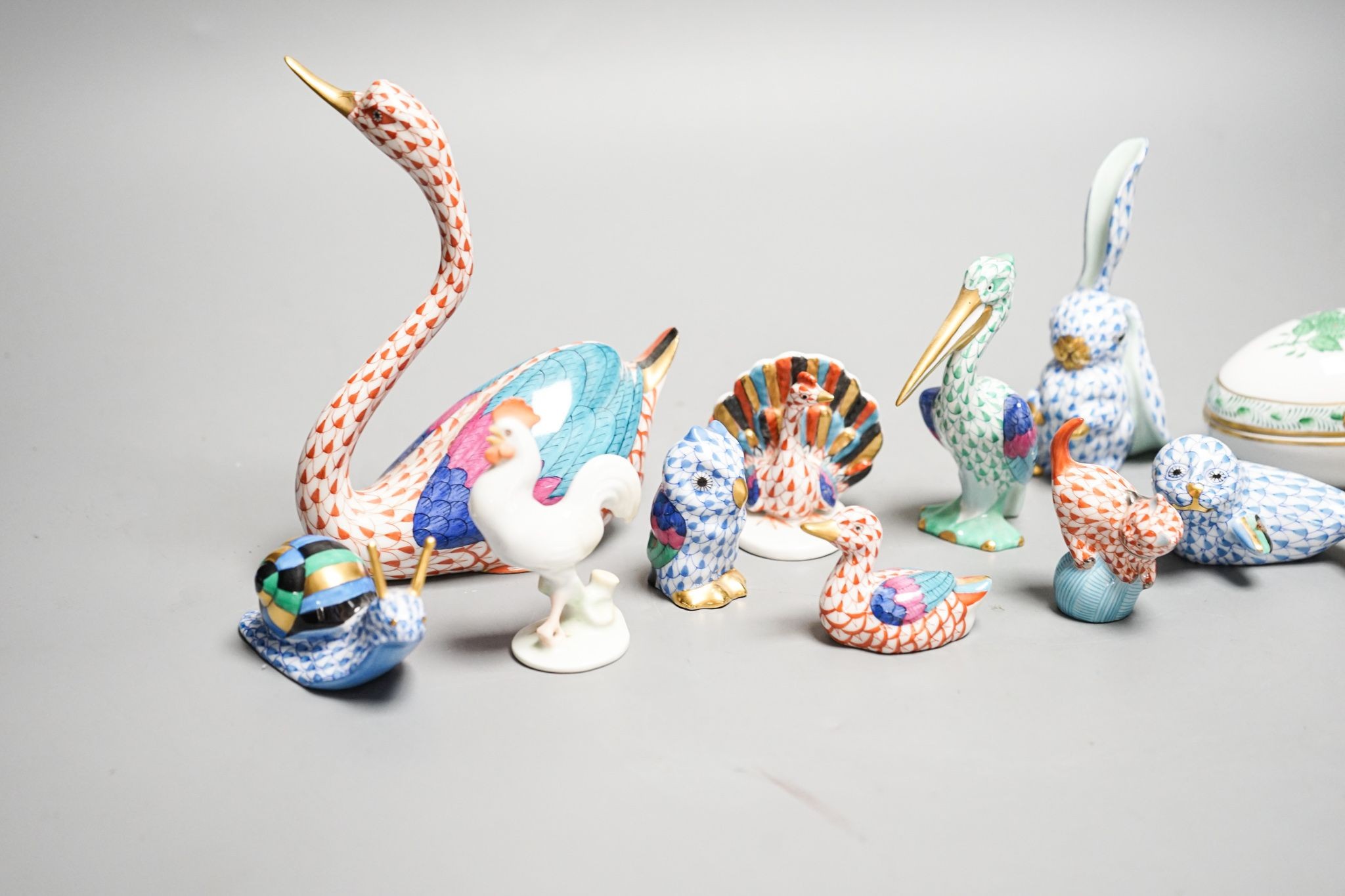 11 Herend porcelain animals and a similar egg shaped box